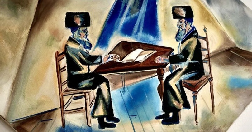 Twee Joodse mannen zittend aan een tafel