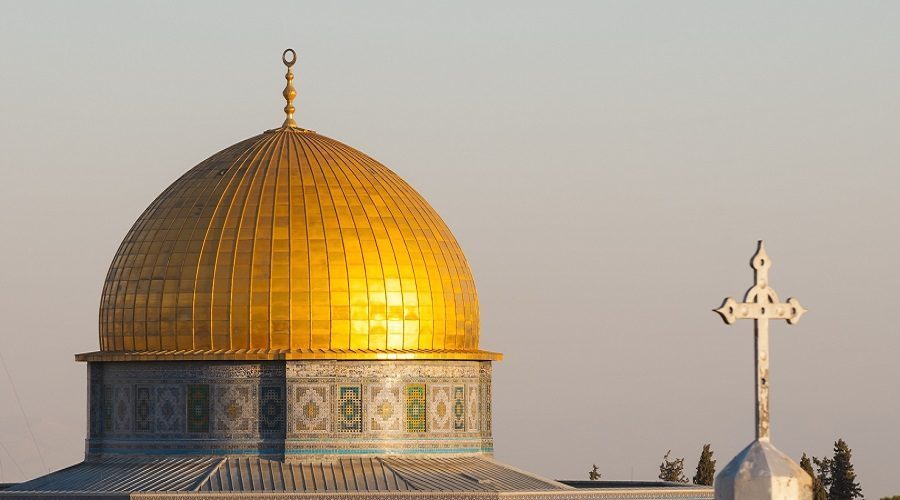 Islamic crescent and Christian cross in Jerusalem’s Old City