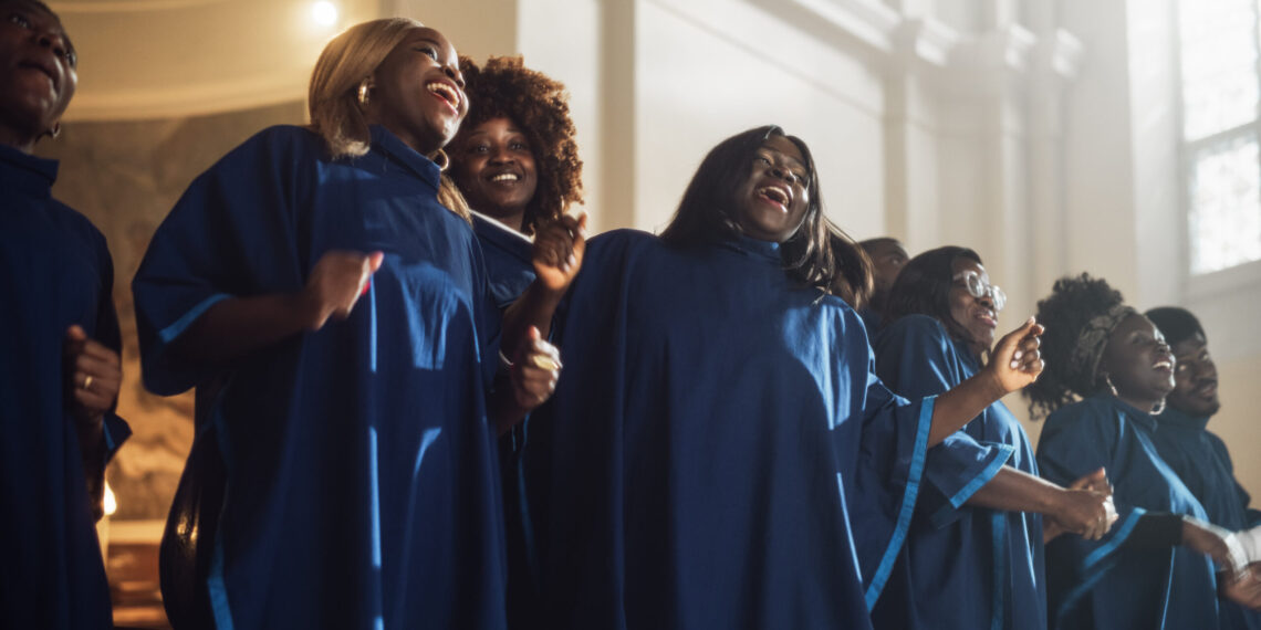 Group Of Christian Gospel Singers Praising Lord Jesus Christ. Song Spreads Blessing, Harmony in Joy and Faith. Church is Filled with Spiritual Message Uplifting Hearts. Music Brings Peace, Hope, Love