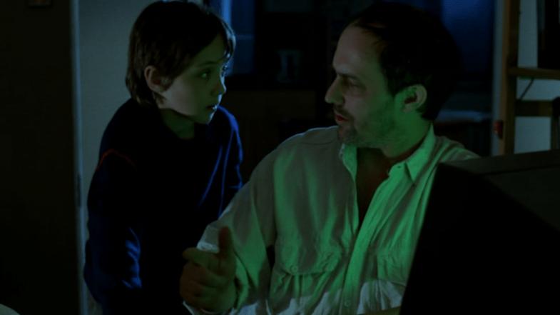 Pawal en vader achter de computer