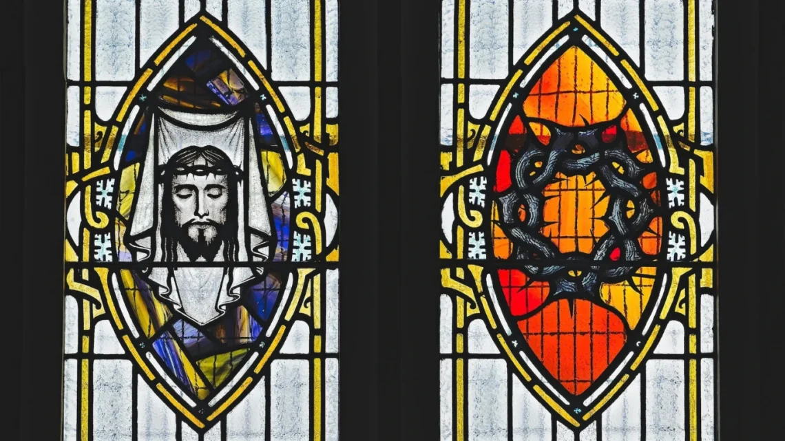 Black framed glass window with womans face