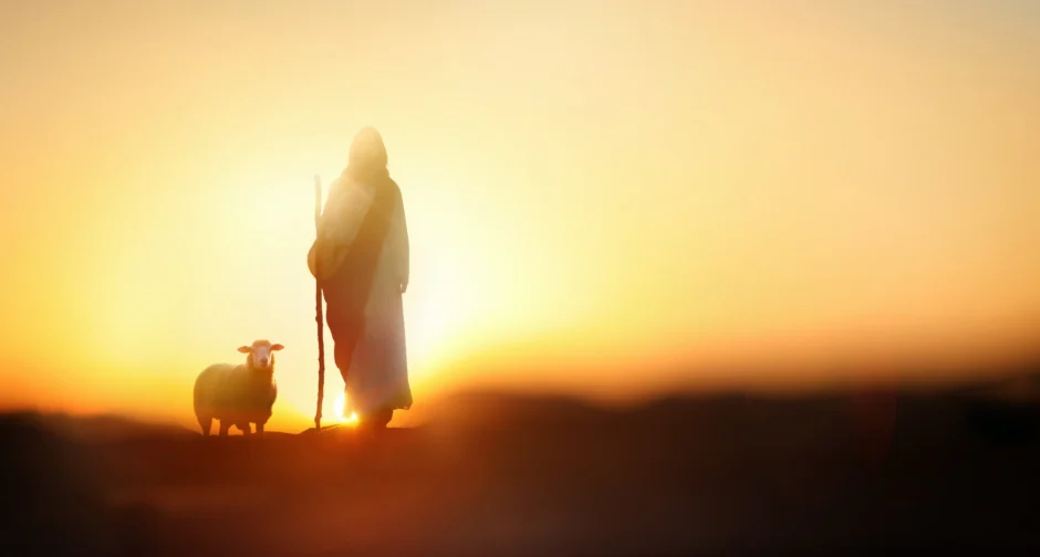 Jezus, de Goede Herder, die wandelt met een schaap en een wandelstok.